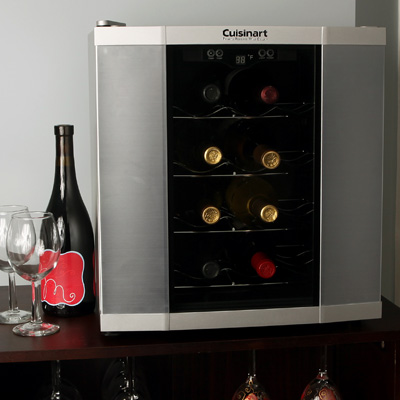 CUISINART® Private Reserve™ Wine Cellar - Traditional stainless steel styling and the option of soft interior lighting let you beautifully display up to 12 bottles of wine and champagne. Patented temperature control guarantees that different varieties are stored at ideal serving temperatures. Thermoelectric “compressor-less” cooling makes this countertop cellar lightweight, easy to carry… and quiet!